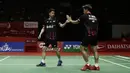 Ganda putra Indonesia, Kevin Sanjaya Sukamuljo/Marcus Fernaldi Gideon, saat menghadapi ganda Malaysia, Aaron Chia/Soh Wooi Yik, pada laga Indonesia Masters 2020 di Istora Senayan, Jakarta, Sabtu (18/1). Kevin/Marcus menang dua gim dengan skor 21-19 dan 21-19. (Bola.com/Yoppy Renato)