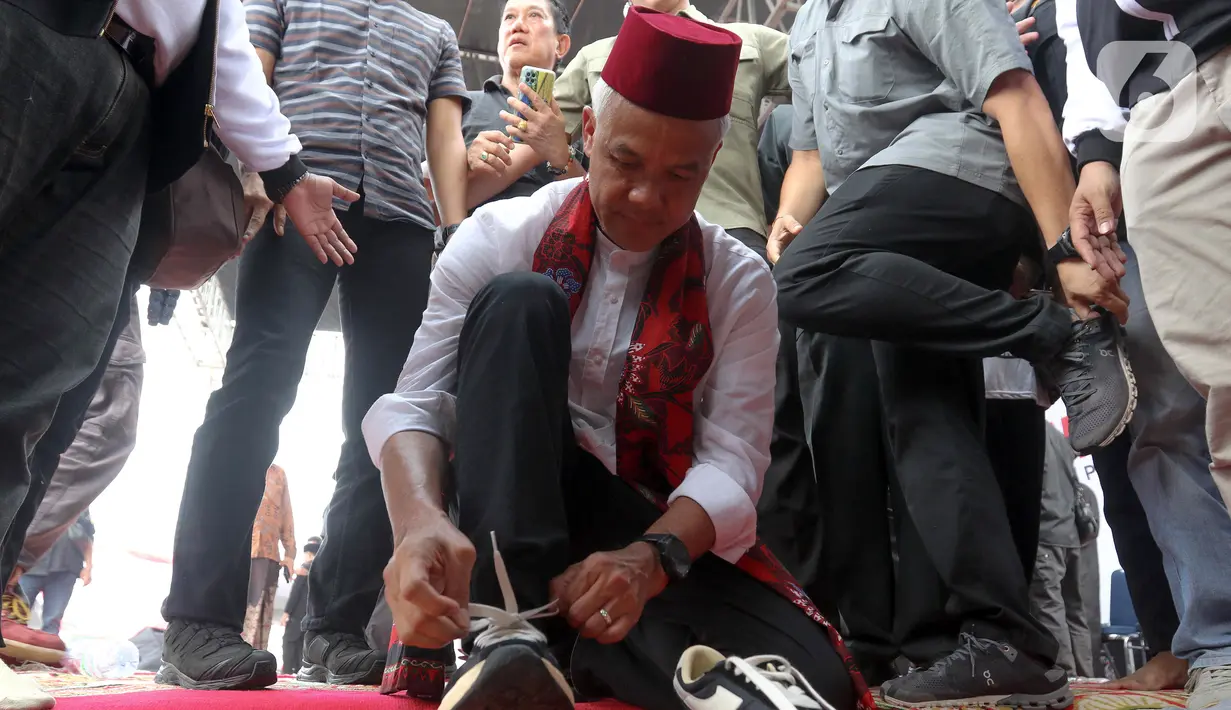 Dia meminta agar pendukungnya terus mengingat rambut putih yang identik dengan dirinya pada saat mencoblos surat suara di TPS. (Liputan6.com/Herman Zakharia)