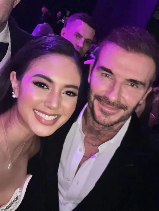Aurelie Moeramas tampil memukau kala bertemu David Beckham di sebuah pesta di Macao. [Foto: Instagram/ Aurelie]