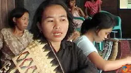 Citizen6, Lampung: seorang ibu mengenakan kain tapis, khas Lampung. (Pengirim: Lampung)