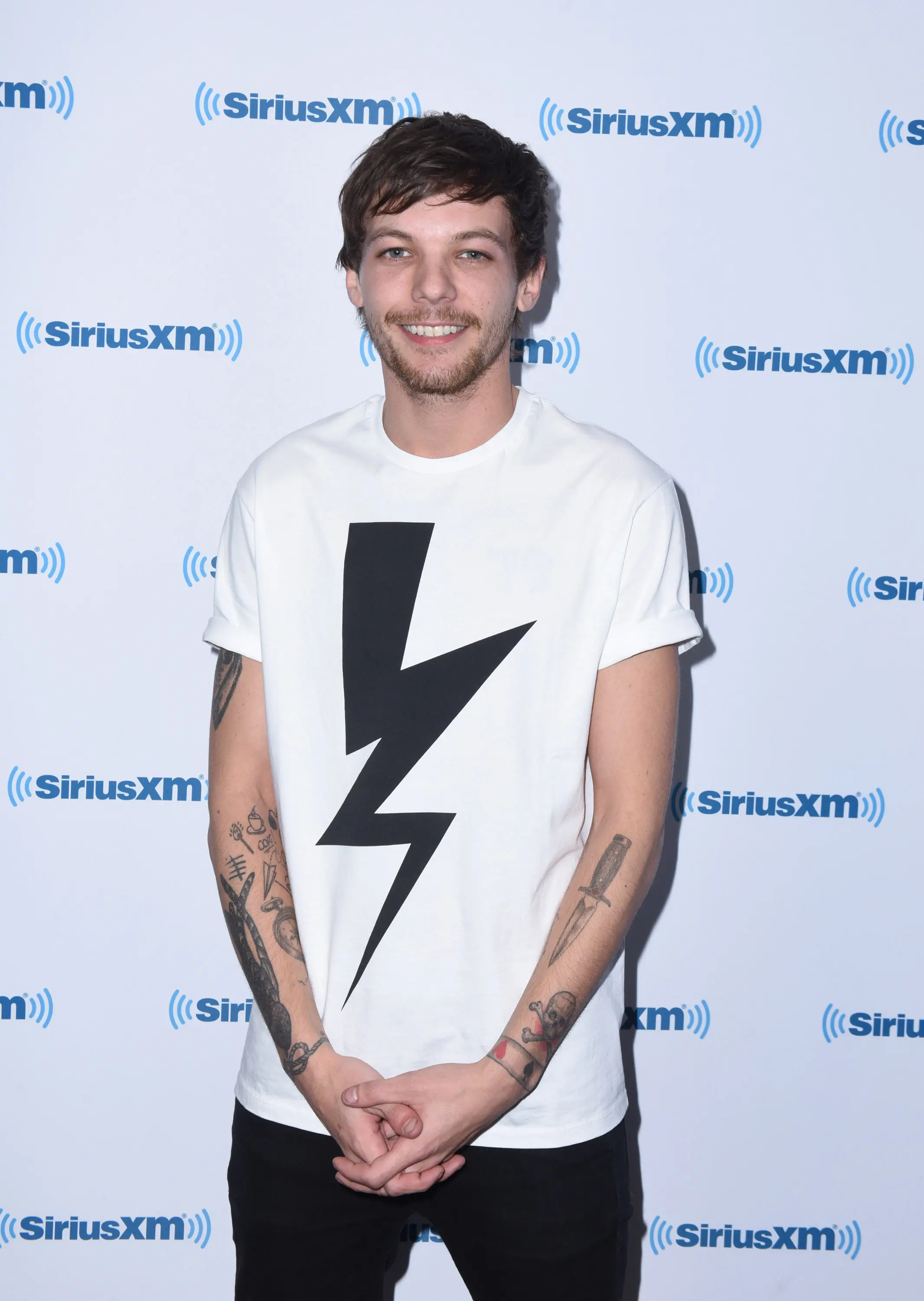 Louis Tomlinson. (AFP/Vivien Killilea)