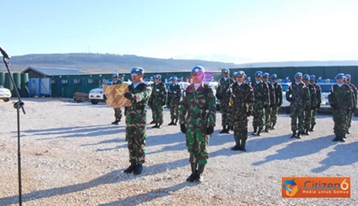 Citizen6, Lebanon Selatan: Wakil Komandan Satgas (Wadansatgas) POM TNI Mayor Laut (PM) Wahyu Dwi Sulistyo, mewakili Dansatgas Letkol Cpm Ida Bagus Rahwan Diputra, bertindak sebagai Inspektur Upacara (Irup). (Pengirim: Badarudin Bakri)