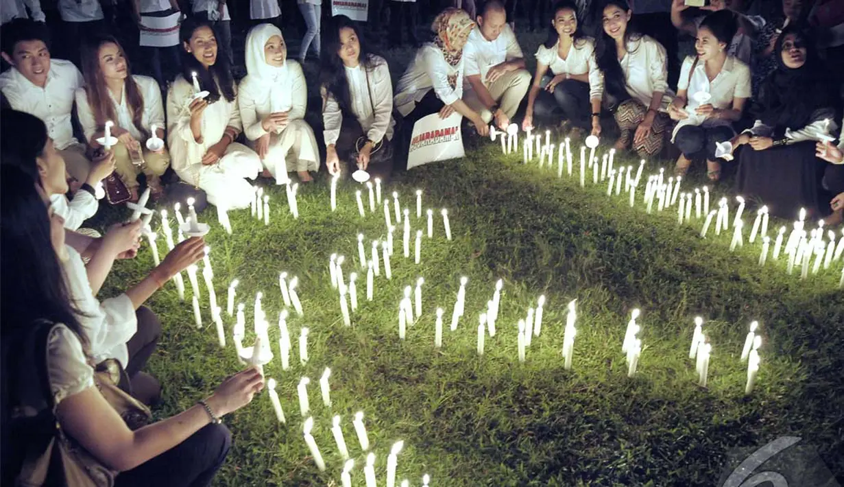 Mereka berharap, Indonesia kembali bersatu dalam kedamaian seperti sediakala, Pasar Festival, Kuningan, Jakarta, Sabtu (12/7/2014) (Liputan6.com/Johan Tallo)