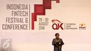 Ketua Dewan Komisioner OJK, Muliaman Hadad memberikan sambutan pada pembukaan Indonesia Fintech Festival & Conference di Tangerang, Selasa (30/8). Fintech merupakan industri jasa keuangan berbasis teknologi digital. (Liputan6.com/Faizal Fanani)