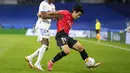 Mallorca mencoba memperkecil angka lewat Lee Kang-In (kanan) semenit kemudian. Lee Kang-In sukses menembak bola ke tiang jauh gawang yang dijaga Thibaut Courtis setelah meneruskan umpan dari Matthew Hoppe. (AP/Manu Fernandez)