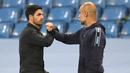 Laga Manchester City melawan Arsenal pada pekan ke-3 Liga Inggris 2021/2022 nanti akan menjadi pertemuan ke-6 Pep Guardiola dengan Mikel Arteta. (Foto: AFP/Pool/Peter Powell)