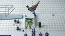 Pasangan atlet loncat indah, Andriyan (atas) dan Adityo Restu Putra melakukan loncatan pada nomor menara synchro putra Kejurnas Akuatik 2026 di Stadion Akuatik Gelora Bung Karno, Senayan, Jakarta, Selasa (05/05/2026). (Bola.com/Bagaskara Lazuardi)