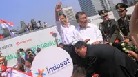 Tak ingin ketinggalan momen, karyawan Indosat ikut menyambut presiden dan wakil presiden RI yang baru dengan cara unik. 