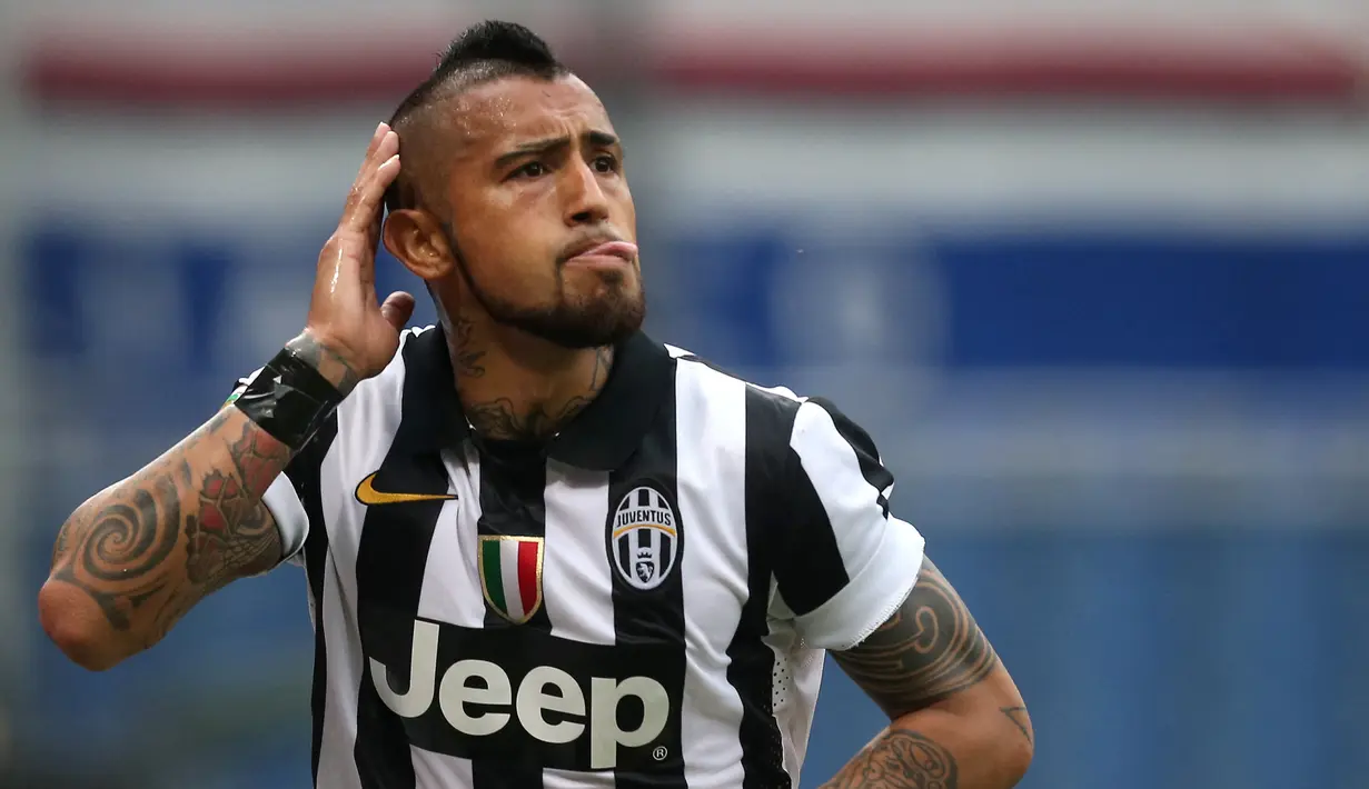 Arturo Vidal. Gelandang Cile berusia 34 tahun yang kini memasuki musim kedua bersama Inter Milan ini mampu menjadi top skor Juventus di Liga Italia yaitu musim 2012/2013. Ia mampu mencetak 10 gol di musim keduanya tersebut dari total 4 musim berseragam Juventus. (AFP/Marco Bertorello)