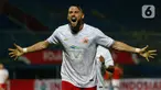 Penyerang Persija Jakarta, Marko Simic berselebrasi usai mencetak gol ke gawang Borneo FC Samarinda dalam pertandingan Babak Penyisihan Grup B Piala Menpora 2021 di Stadion Kanjuruhan, Malang, Sabtu (27/3/2021). Persija menang telak atas Borneo FC Samarinda 4-0. (Bola.com/Ikhwan Yanuar)