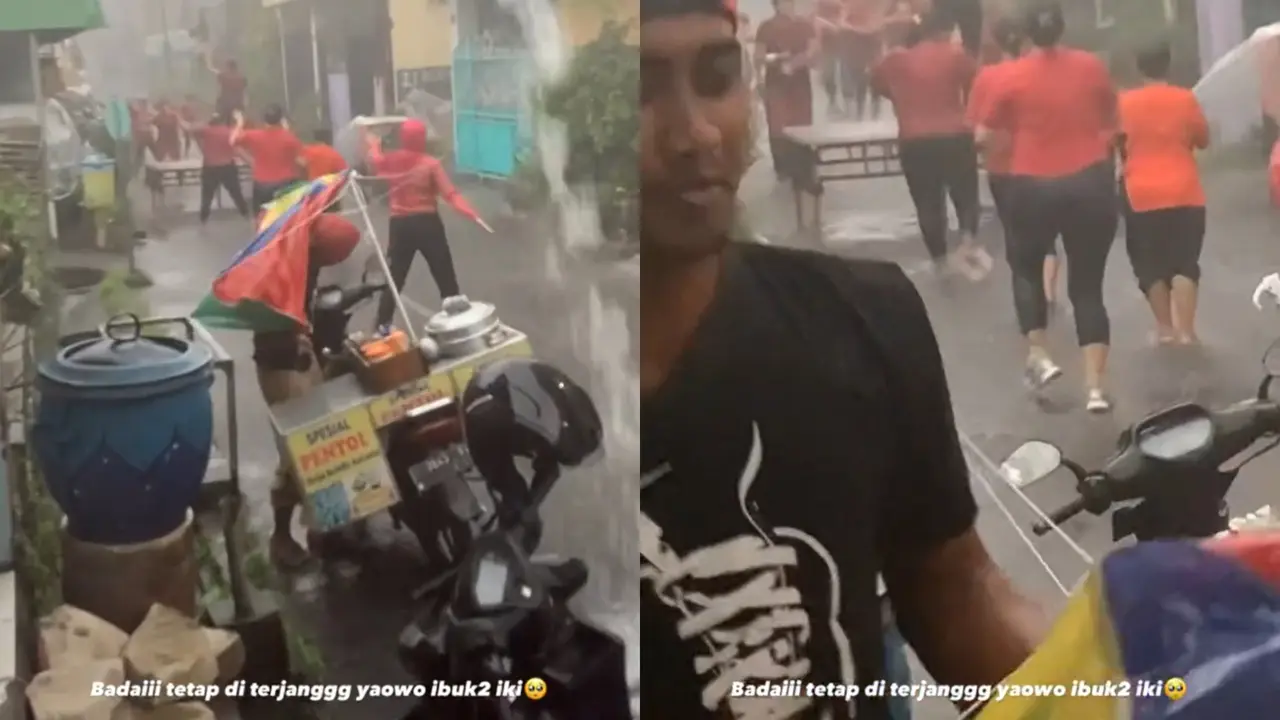 Aksi emak-emak olah raga saat hujan deras