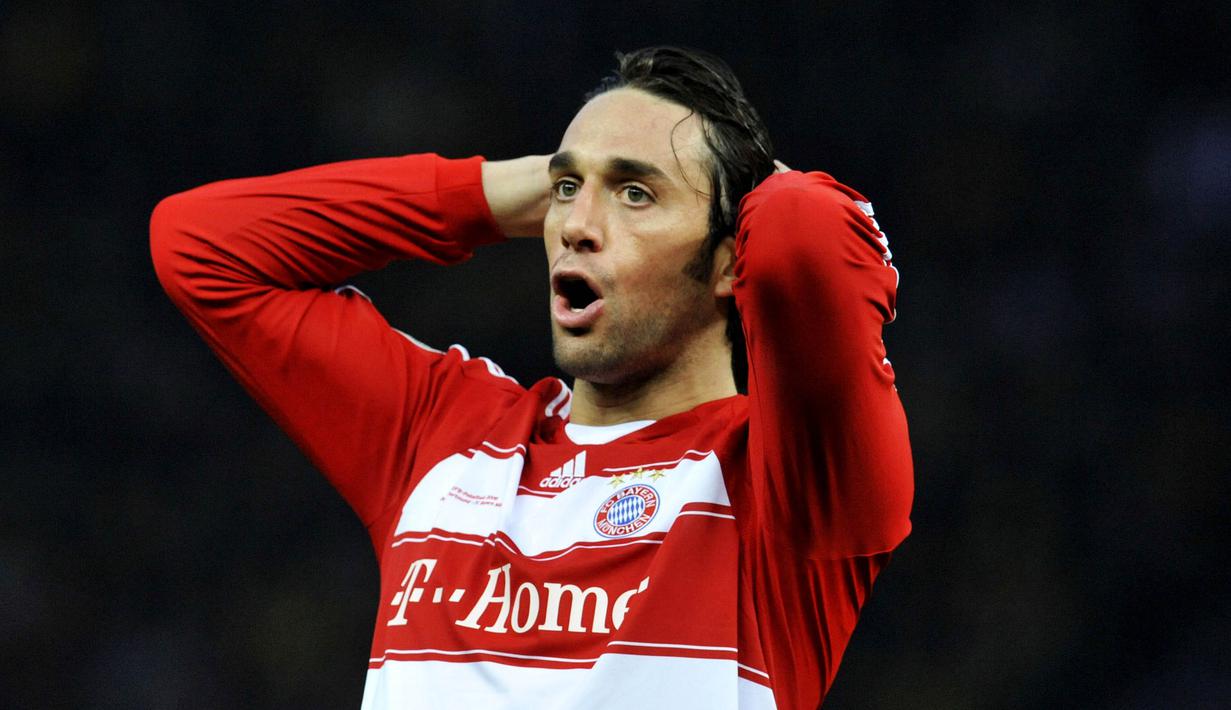 1. Luca Toni - Pemain asal Italia ini juga termasuk pemain yang doyan pindah klub. Total 15 klub pernah dibela penyerang jangkung ini, termasuk klub-klub besar seperti Bayern Munchen, Juventus dan AS Roma. (AFP/John Macdougall)