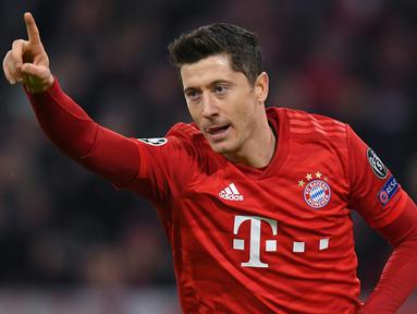 Lewandowski kini menjadi top skor sementara di pentas Liga Champions 2019/20. Pemain asal Polandia ini telah mengoleksi 11 gol di ajang kompetisi bergengsi antar klub Eropa tersebut. (AFP/Christof Stache)