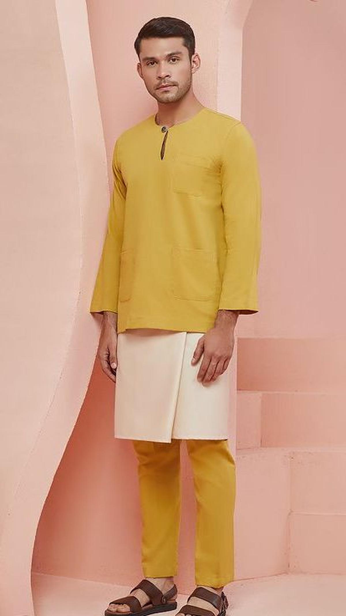 <b>Baju Kurung Model Teluk Belanga</b>