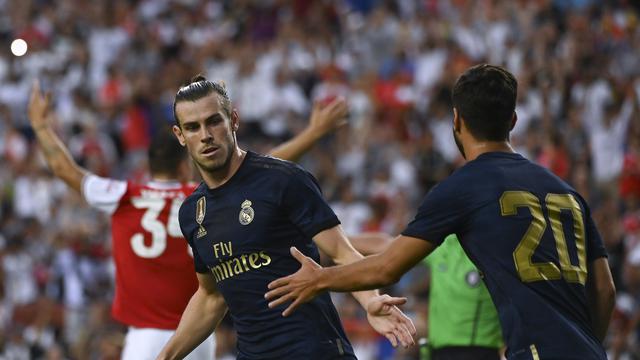 Marco Asensio saat memperkuat Real Madrid di arena ICC 2019