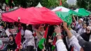 Aksi Protes Global dilakukan di 100 kota dunia untuk menuntut penghentian genosida di Gaza, Palestina. (AP Photo/Dita Alangkara)