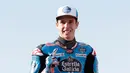 Pembalap Moto2 Alex Marquez berpose di depan Valencia Motorcycle Grand Prix, Spanyol, Minggu (17/11/2019). Alex Marquez sukses merebut gelar juara dunia Moto2 tahun 2019. (AP Photo/Alberto Saiz)