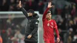 Di bawah manajemen Klopp, Roberto Firmino tumbuh menjadi penyerang yang luar biasa di Liverpool. Ia memiliki kecerdasan, antisipasi, dan kemampuan mencetak golnya yang bagus. Saat ini, Firminho telah melesatkan 94 gol dan 73 assist dalam 312 penampilannya bersama The Reds. (AFP/Oli Scarff)