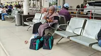 Penumpang Tertahan di Bandara Radin Inten II (Foto: Ardi Munthe/Liputan6.com)