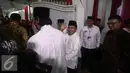 Wakil Presiden Jusuf Kalla menghadiri Haul mantan Ketua MPR Taufiq Kiemas, Jakarta, Rabu (8/6). Haul yang dilaksanakan tertutup untuk wartawan tersebut dihadiri sejumlah menteri dan pejabat tinggi.(Liputan6.com/Faizal Fanani)
