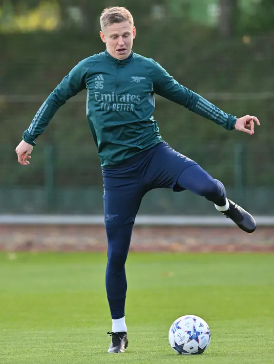 <p>Arsenal kini masih memimpin Grup B dengan enam poin, hasil dari dua kemenangan dan sekali kalah dari tiga pertandingan yang sudah dijalani. (Glyn KIRK / AFP)</p>