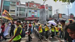 Ribuan orang di seluruh dunia turun ke jalan sebagai aksi mendesak upaya perlawanan perubahan iklim dalam Global Climate Strike 2023 mulai 15 September 2023 hingga 17 September 2023. (Liputan6.com/Angga Yuniar)