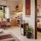 Desain Rumah Mungil untuk Orang Tua Agar Nyaman Tanpa Banyak Sekat. (Foto: AI)