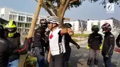 Beredar rekaman video perseteruan antara pengendara motor gede dan pesepeda di tengah jalan.