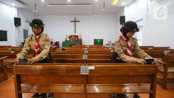 Kwartir Nasional (Kwarnas) gerakan Pramuka menggelar kegiatan bakti sosial seperti bedah rumah, bersih-bersih rumah ibadah, dan berbagi sembako. (Liputan6.com/Angga Yuniar)