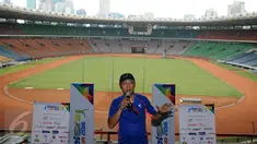 Benhur Panjaitan memberikan keterangan terkait pelaksanaan Gelora Run 2016 di Stadion GBK Jakarta, Rabu (18/5/2016). Rencananya, Gelora Run 2016 akan digelar pada Minggu (22/6) dan diikuti sekitar 1500 peserta. (Liputan6.com/Helmi Fithriansyah)