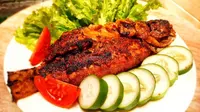 Resep praktis ikan bakar nila teflon dengan bumbu marinasi kunyit. (Dok: Cookpad)