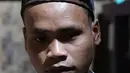 Sosok Hamid Bambang Kusomo (28) saat ditemui di pemukiman mualaf yang berbatasan dengan daerah adat Baduy. Hamid tidak menampik, memilih tinggal di pemukiman warga muslim karena tidak memiliki rumah di Baduy. (Liputan6.com/Herman Zakharia)