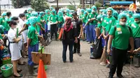 Bersihkan Sisa Banjir di Bukit Duri dengan Gerakan Antikuman