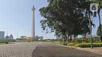 Contoh aspal lintasan Formula E terlihat di kawasan Monas, Jakarta, Minggu (23/2/2020). Aspal untuk sirkuit Formula E di uji coba di Monas, lokasi pengaspalan itu berada di Monas bagian timur. Pengaspalan dilakukan dengan dua metode, sandsheet dan geotextile. (Liputan6.com/Herman Zakharia)