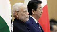 Perdana Menteri India Narendra Modi melakukan kunjungan tiga hari ke Jepang, bertemu dengan PM Shinzo Abe (AP/Kiyoshi Ota)