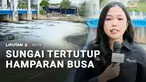 Hamparan busa di aliran Kanal Banjir Timur Marunda, Cilincing, Jakarta Utara. Ada Michaela Winda di sana.