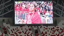 Ekspresi Triyaningsih saat lagu Indonesia Raya dikumandangkan. (Bola.com/Arief Bagus)