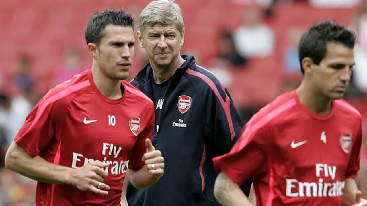cesc-fabregas-robin-van-persie-131129b.j
