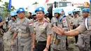 Kapolri Jenderal Sutarman saat tiba di Pos AL Tanjung Pasir Teluk Naga untuk melakukan tradisi pembaretan 140 anggota FPU Indonesia VI (Liputan6.com/Helmi Fithriansyah)