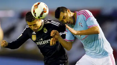 Duel panas terjadi di laga Liga Spanyol antara Celta Vigo dengan Real Madrid  di Stadion Balaidos , Spanyol, Senin (27/4/2015). Real Madrid menang 4-2 atas Celta Vigo. (REUTERS/Miguel Vidal)