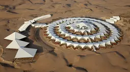 Desert Lotus Hotel dibangun di tengah gurun padang pasir Xiangshawan, Mongolia. Hotel ini didesain seperti tenda-tenda yang bila dilihat dari atas akan terlihat seperti lingkaran dalam gurun tandus Xiangshawan. (chictraveler.com)