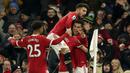 Manchester United berbalik unggul di awal babak kedua. Pada menit ke-52 Cristiano Ronaldo mencetak gol kedua Setan Merah usai memaksimalkan umpan yang dilepaskan Marcus Rashford. (AP/Dave Thompson)