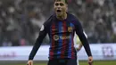 Gelandang Barcelona, Pedri berselebrasi setelah mencetak gol ke gawang Real Madrid pada final Piala Super Spanyol di Stadion King Fahd, di Riyadh, Arab Saudi, Senin (16/1/2023). Barcelona kali terakhir meraih gelar juara Piala Super Spanyol pada edisi 2018 setelah mengalahkan Sevilla dengan skor 2-1. (AP Photo/Hussein Malla)