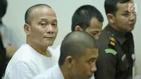 Rapper Iwa K menjalani sidang perdananya di Pengadilan Negeri Tangerang, Rabu (6/9). Sidang ini terkait kasus penyalahgunaan narkoba yang menjerat Iwa beberapa waktu lalu. (Liputan6.com/Pool)