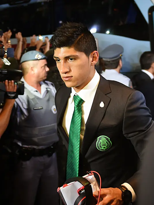 Saat kejadian penculikan, penyerang timnas Meksiko, Alan Pulido sedang bersama kekasihnya, Ileana Salas. Namun para penculik itu membiarkan kekasih pemain 25 tahun itu begitu saja. (Yuri CORTEZ/AFP)