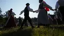 Midsummer Day adalah salah satu perayaan tertua dan terpenting di Estonia. (AP Photo/Pavel Golovkin)