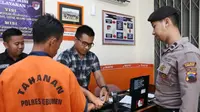 Tersangka pembunuhan istri di Kebumen. (Liputan6.com/Polres Kebumen/Muhamad Ridlo)