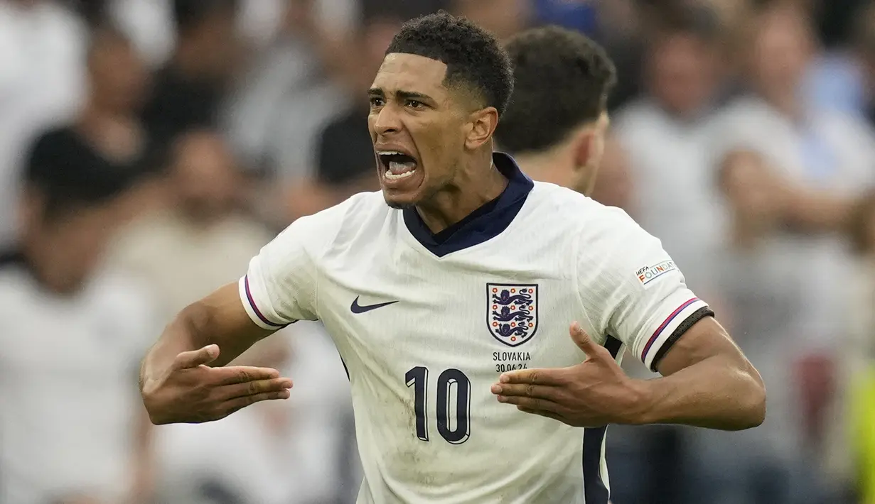Selebrasi gelandang Timnas Inggris, Jude Bellingham setelah mencetak gol penyeimbang 1-1 ke gawang Timnas Slovakia pada laga babak 16 besar Euro 2024 di Arena AufSchalke, Gelsenkirchen, Jerman, Minggu (30/6/2024). (AP Photo/Antonio Calanni)