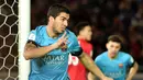 Perayaan gol yang dilakukan bomber Barcelona, Luis Suarez, usai membobol gawang Guangzhou Evergrande. (AFP/Kazuhiro Nogi)