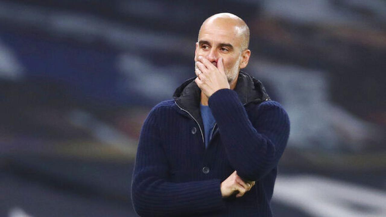 Foto Liga Inggris: Ekspresi Pep Guardiola Saat Manchester City Terkapar di Markas Tottenham Hotspur